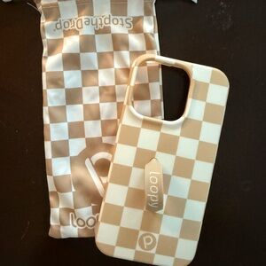Loopy Case - iPhone 14 Pro
Tan Checkers
Excellent Condition